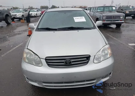 2003 Toyota Corolla Le z USA, uszkodzony, nr VIN JTDBR32E730041318